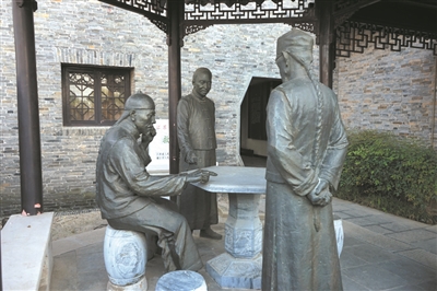 “三位善士討論成立事宜”銅塑